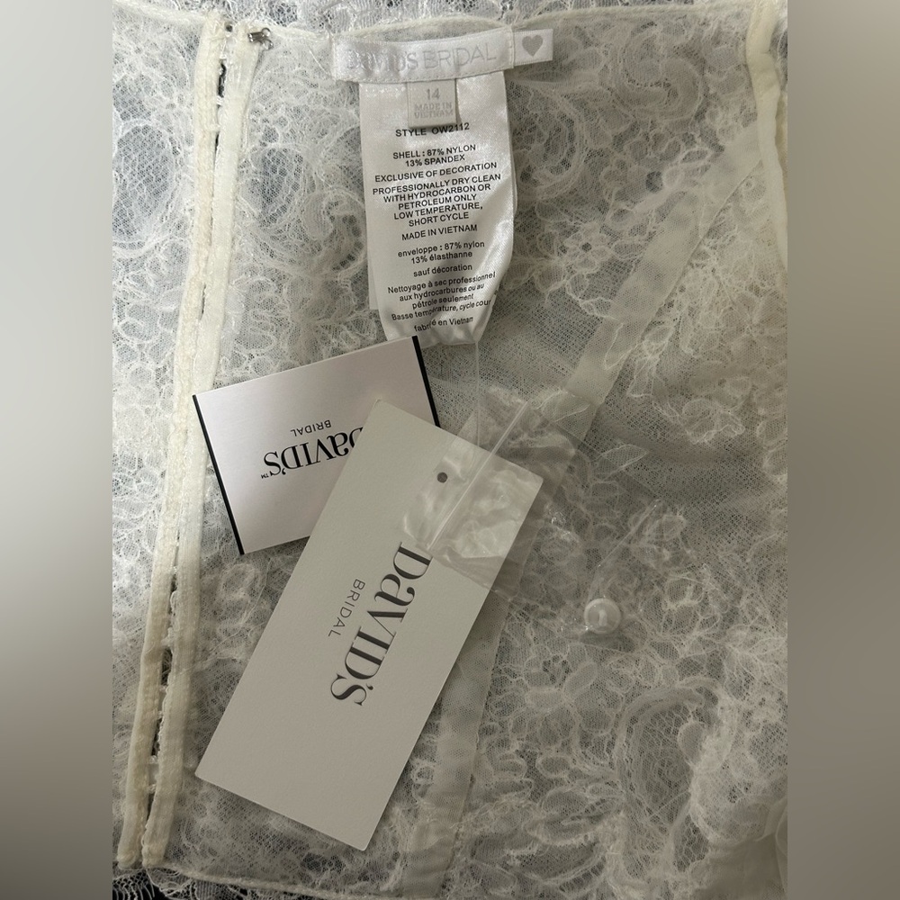 David’s Bridal Ivory Off-the-Shoulder Lace Topper with 3/4 Sleeves - Picture 7 of 10